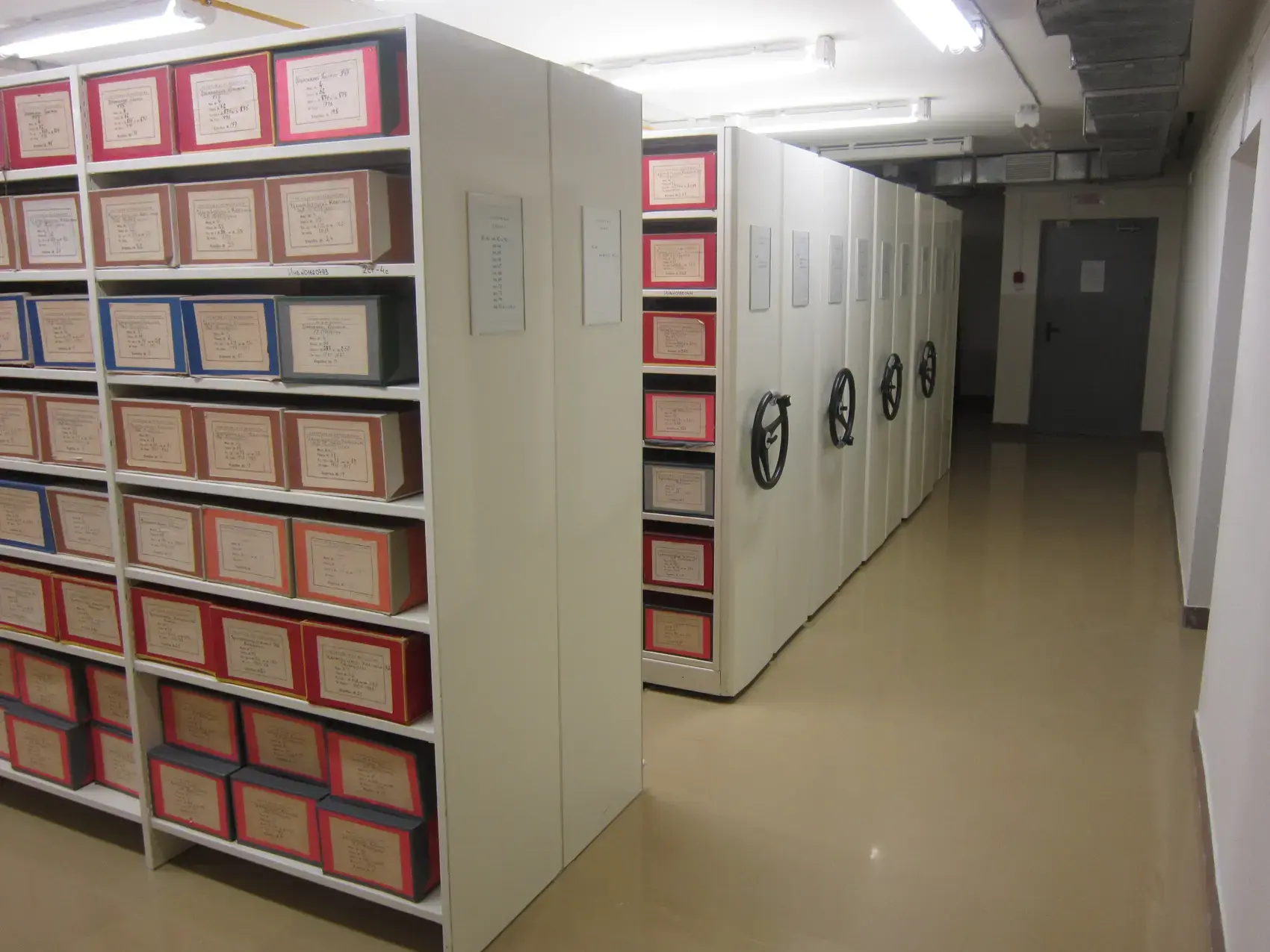 Rolling archive shelves holding boxed records