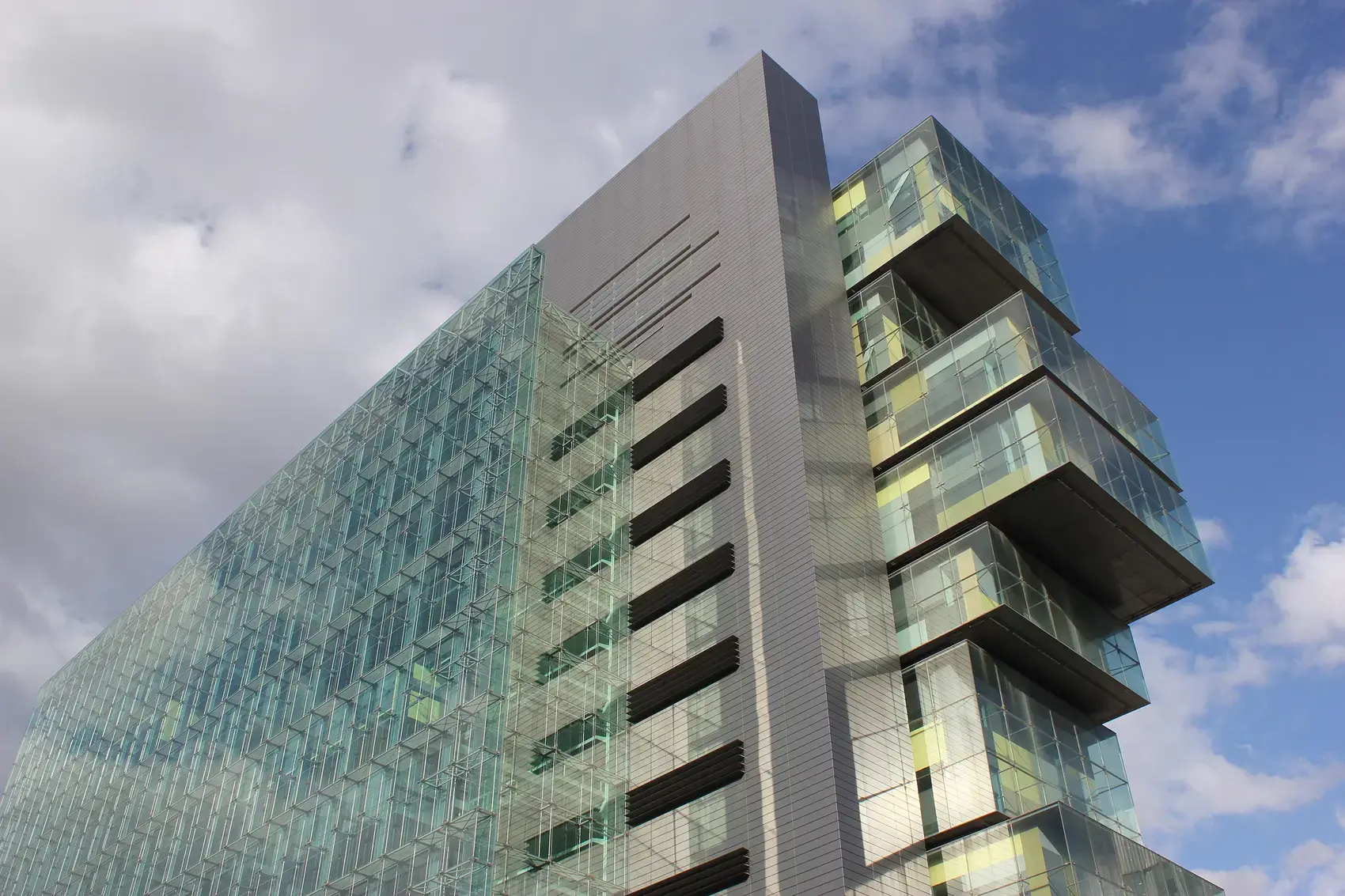 Glass and steel facade of the Manchester Civil Justice Centre
